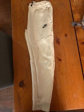 Nike tech Kids Cream Fleece Joggers with Black Logo